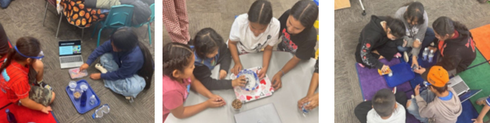 Overhead view of small groups of children sitting on the floor and around a table, collaborating on activities with laptops, trays, cups, and snacks. The students appear engaged in hands-on learning and group discussion in a classroom setting.