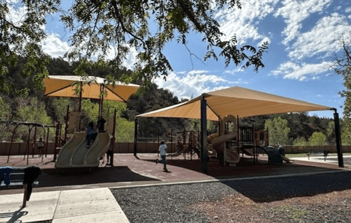 Brand-new playground and beautifully constructed outdoor arbors at John F. Kennedy School!