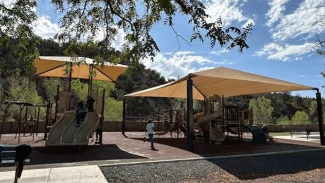 Brand-new playground and beautifully constructed outdoor arbors at John F. Kennedy School! 