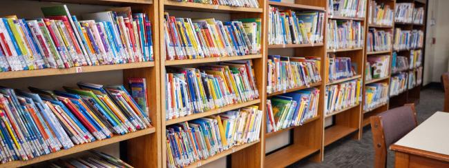 Library shelves full of books.